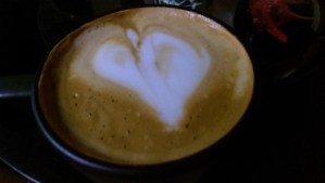 Sipping coffee, dreaming of love, and thinking of home.