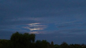 A brief lesson in impermanence when the rising moon disappears.