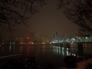 A hazy skyline on a snowy night.