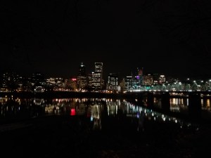 City lights, and a horizon full of traveler's tales.